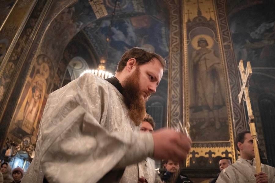 Clerics conduct a service in St.Volodymyr Cathedral on Orthodox Christmas eve in Kyiv.
