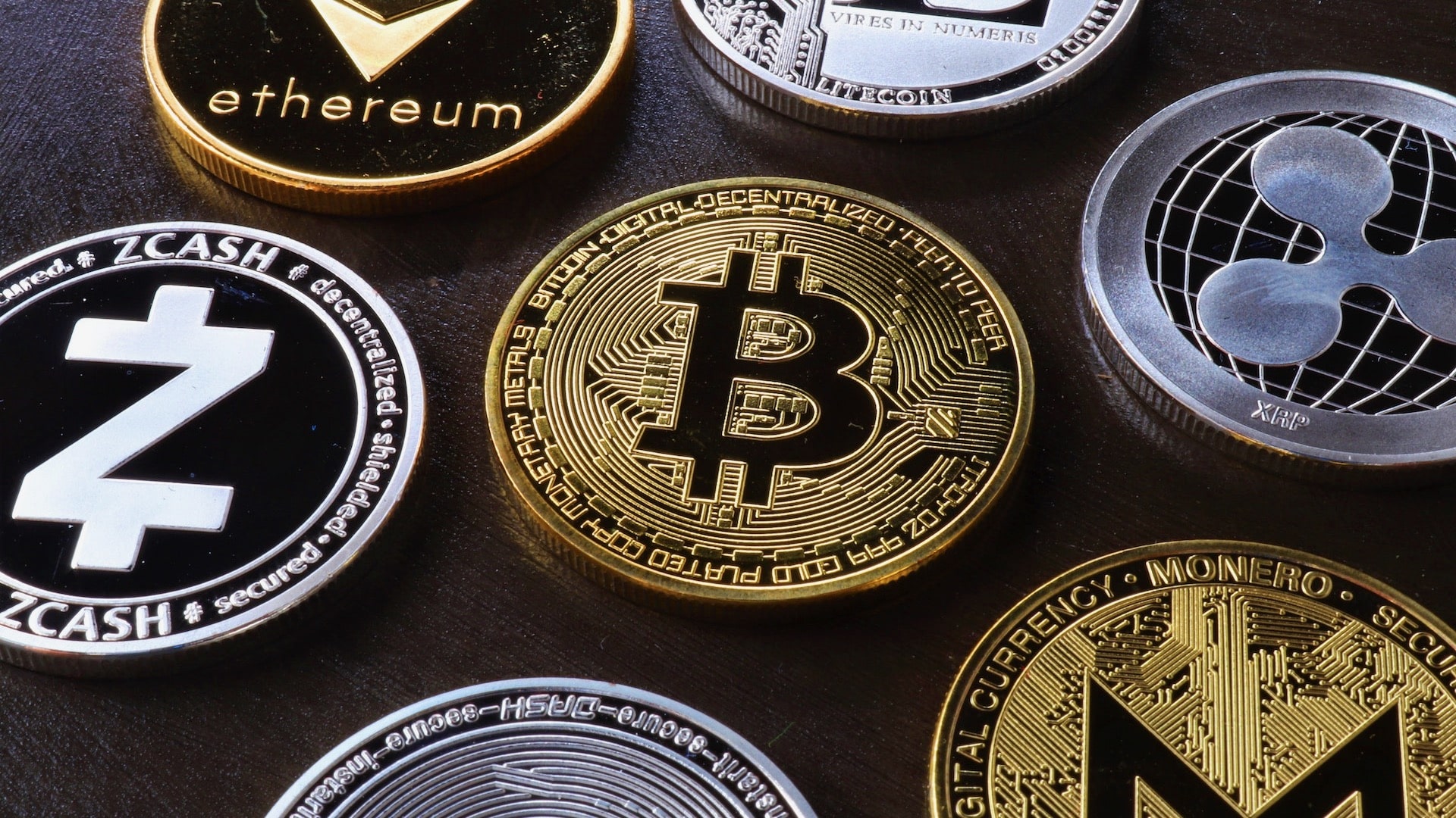 A variety of cryptocurrency coins.