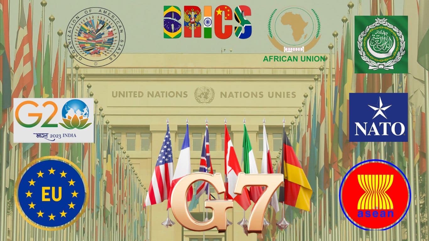 The entrance to the United Nations in Geneva is obscured by the emblems of a dozen international economic and political organizations.