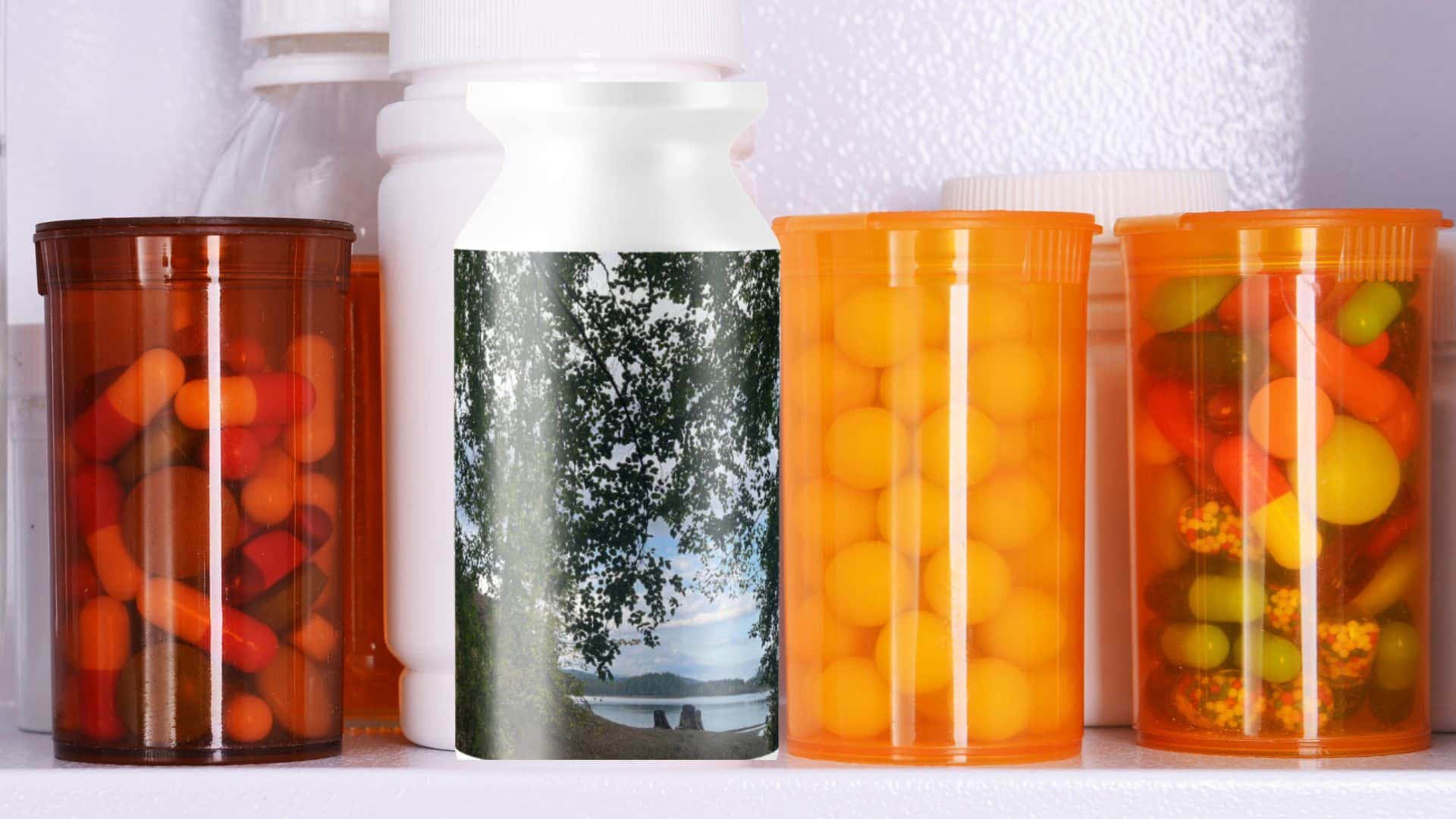 Medicine bottles in a cabinet including one that contains nature.