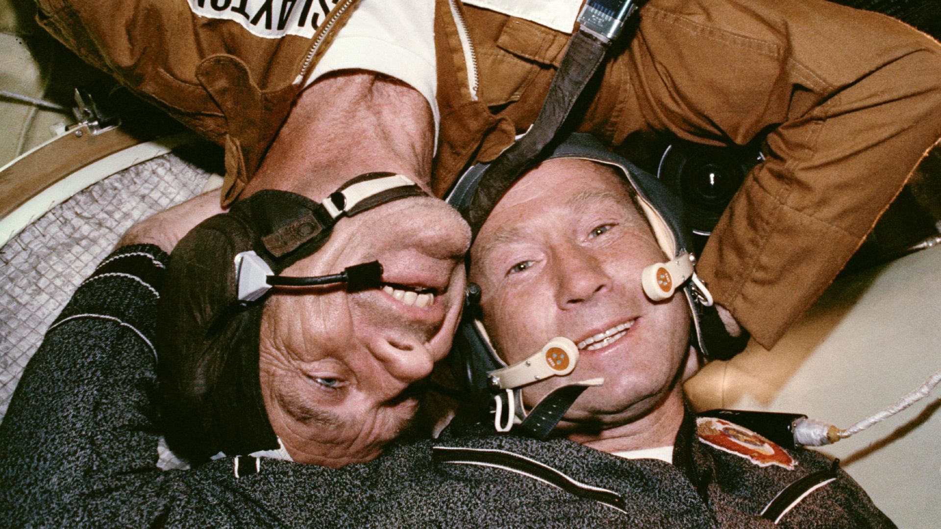 </p>
<p>Astronaut Donald K. Slayton and cosmonaut Aleksey A. Leonov are seen together in the Soyuz Orbital Module during the joint U.S.-USSR Apollo-Soyuz in 1975. Test Project docking mission in Earth orbit.