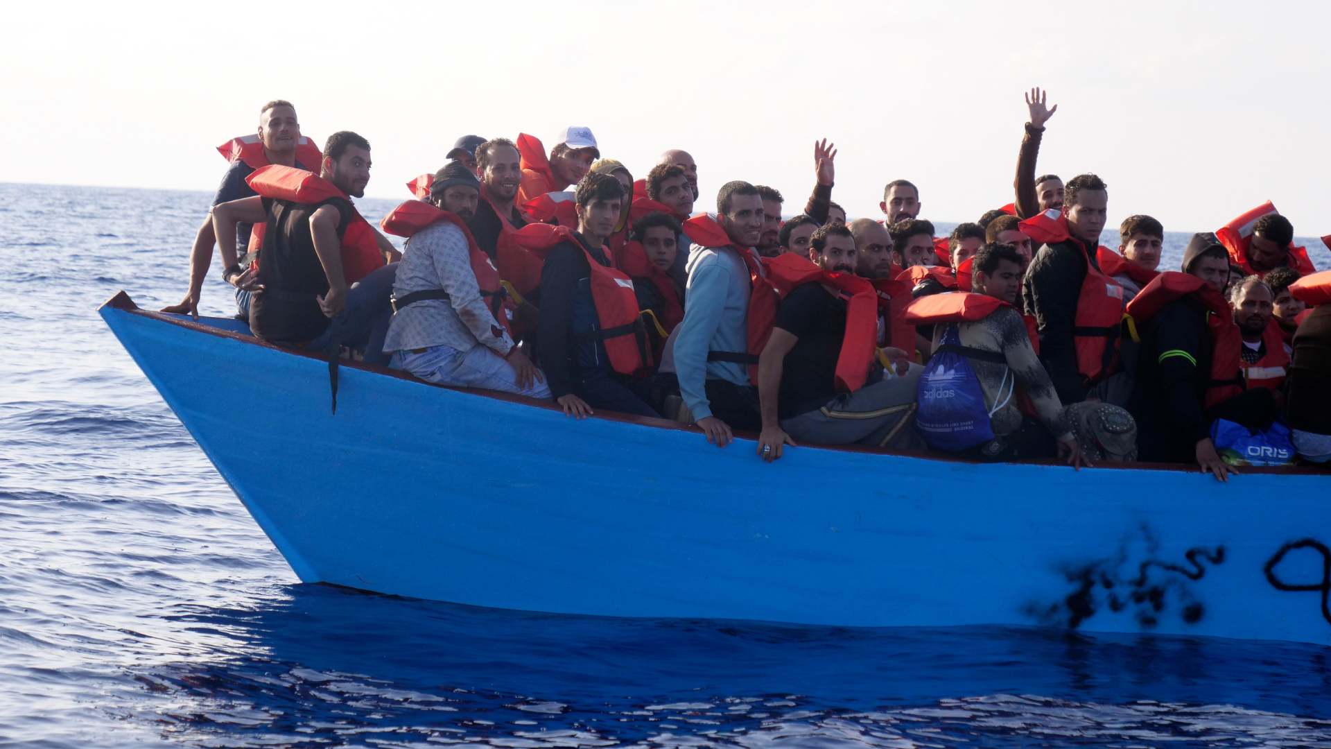 Migrants are rescued by a Doctors Without Borders rescue team boat, after leaving Libya trying to reach European soil, in the Mediterranean Sea.