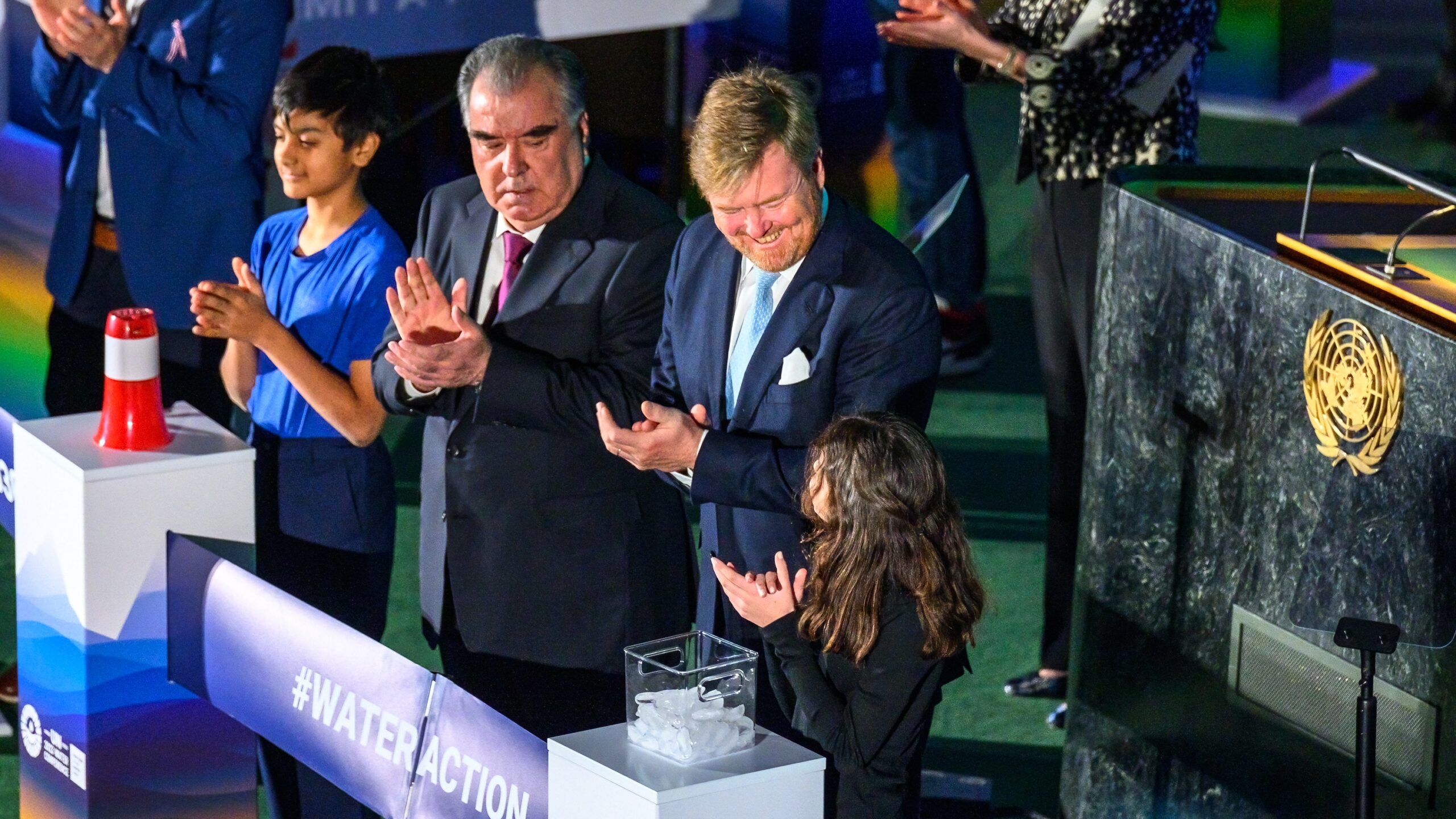 New York, USA, 22 March 2023. Willem-Alexander King of the Netherlands (R) and Emomali Rahmon President of Tajikistan  applaud next to children during the Opening Ceremony of UN 2023 Water Conference, jointly hosted by The Netherlands and Tajikistan.  