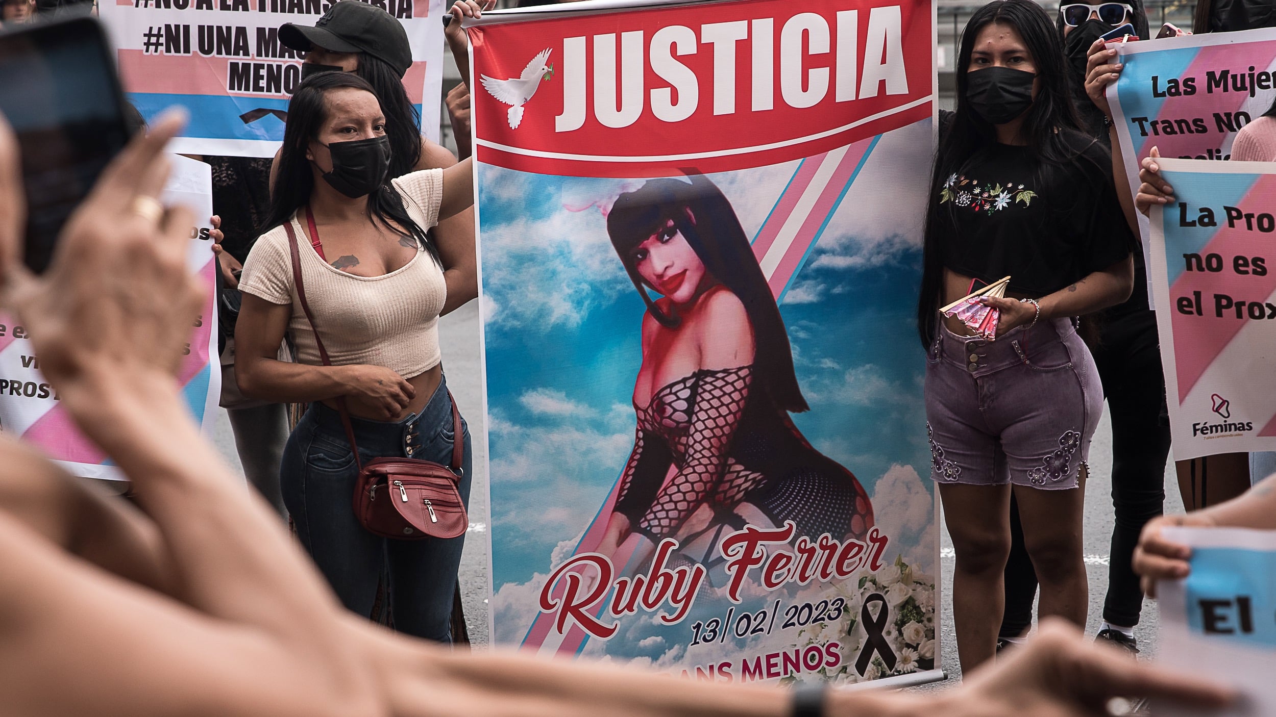A group of transwomen protest outside the police station in downtown Lima, Peru on February.
