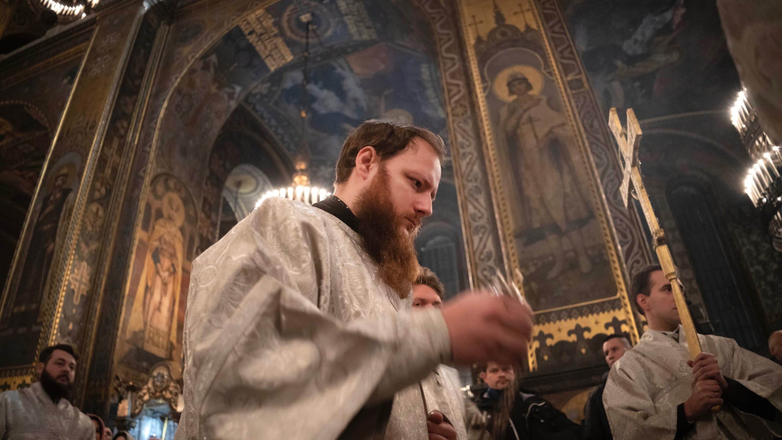 Clerics conduct a service in St.Volodymyr Cathedral on Orthodox Christmas eve in Kyiv.